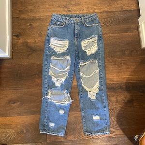 Lightly worn Carmar ripped jeans